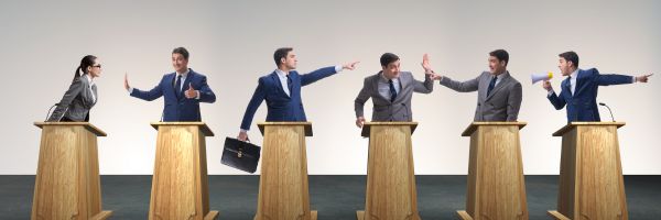 debate people at podiums